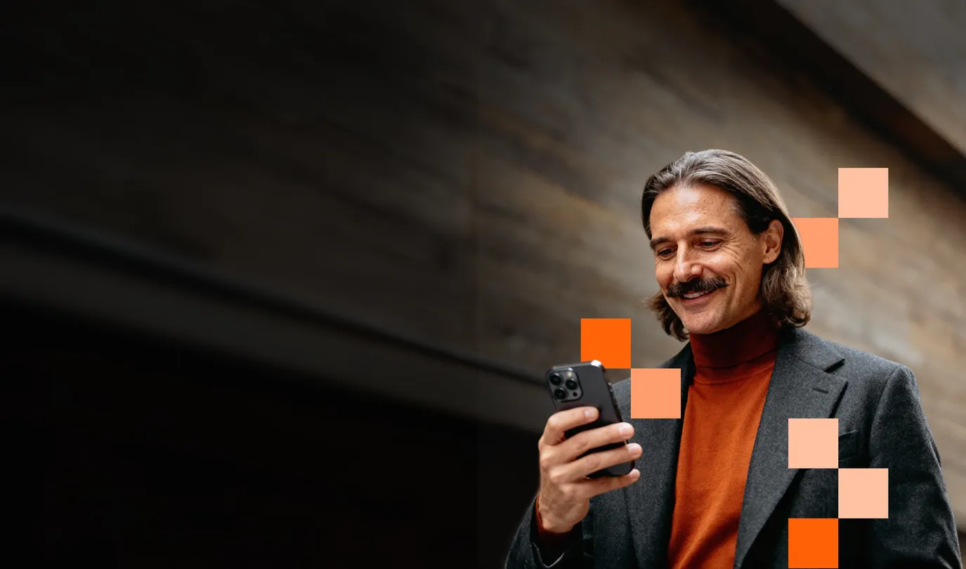 Man checking his phone with confidence, representing simple and secure identity protection.