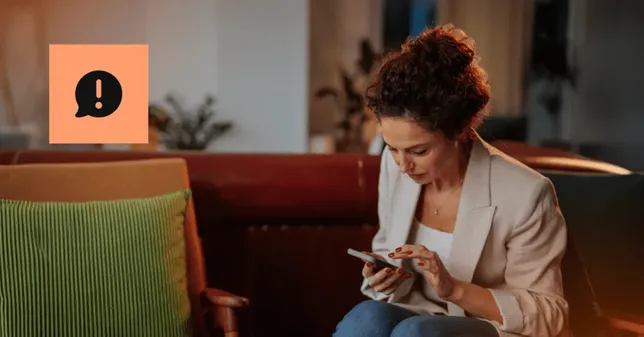 A woman looking at her smartphone