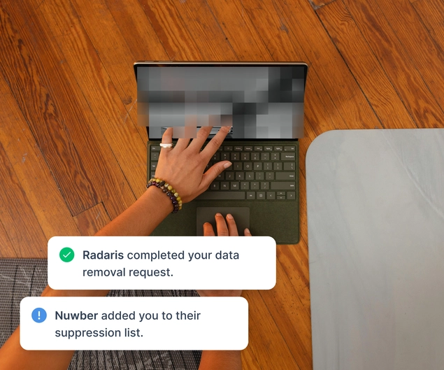 A laptop with a blurred screen, representing how Incogni removes your data from broker sites.